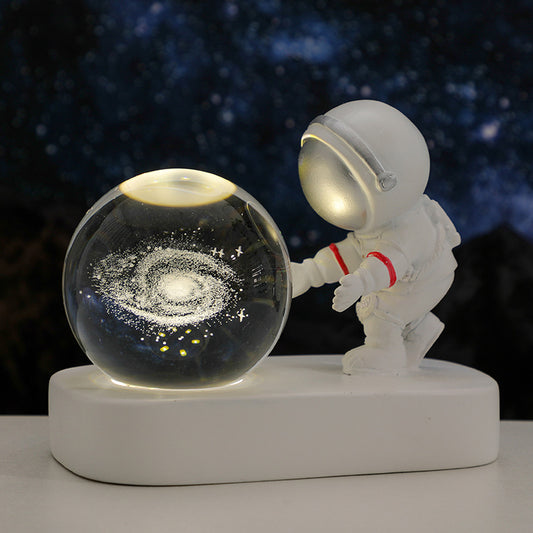 Veilleuse astronaute et boule de cristal